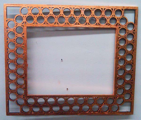 copper leafed mag glass frame