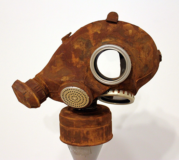Rusted Mask (front view, on pedestal)